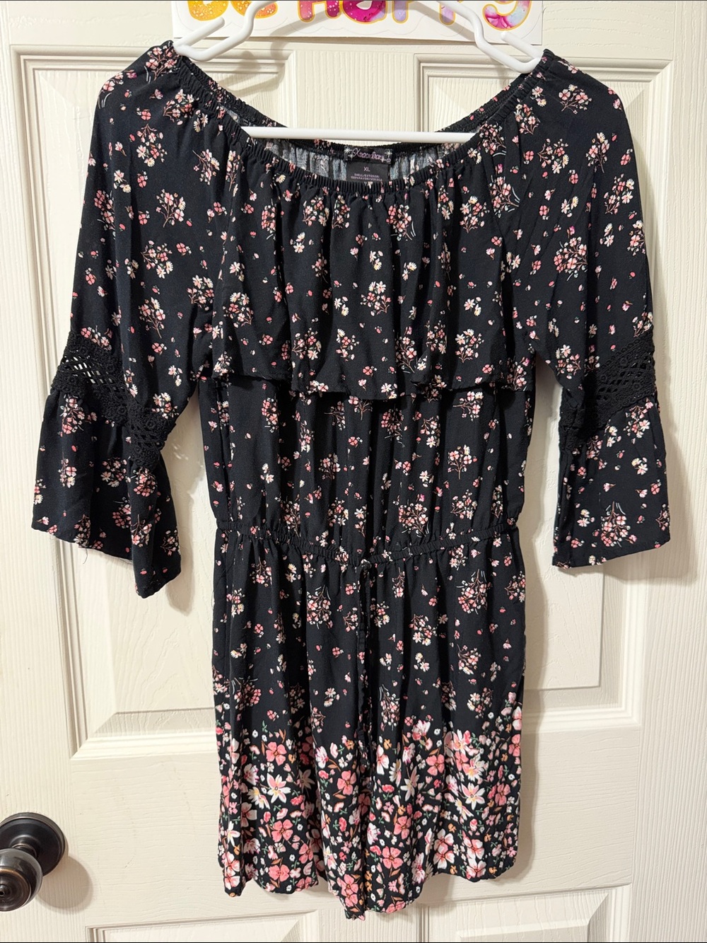 Floral Off-Shoulder Black Romper with Pink Accent